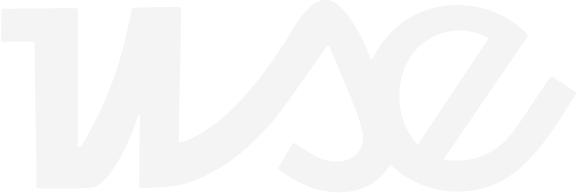 Stylized logo featuring the intertwined lowercase letters wsc in a smooth, flowing design, displayed in light gray on a transparent background.
