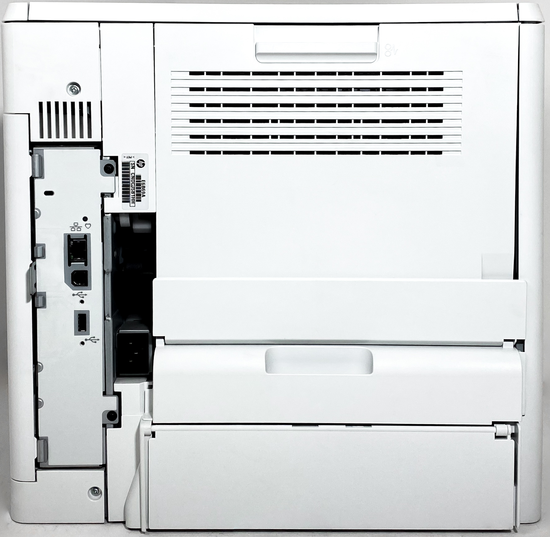 Rear view of the HP LaserJet Enterprise M605n Printer E6B69A, displaying multiple vents, a power switch, various ports, paper trays, and a partially open side panel revealing some internal components.