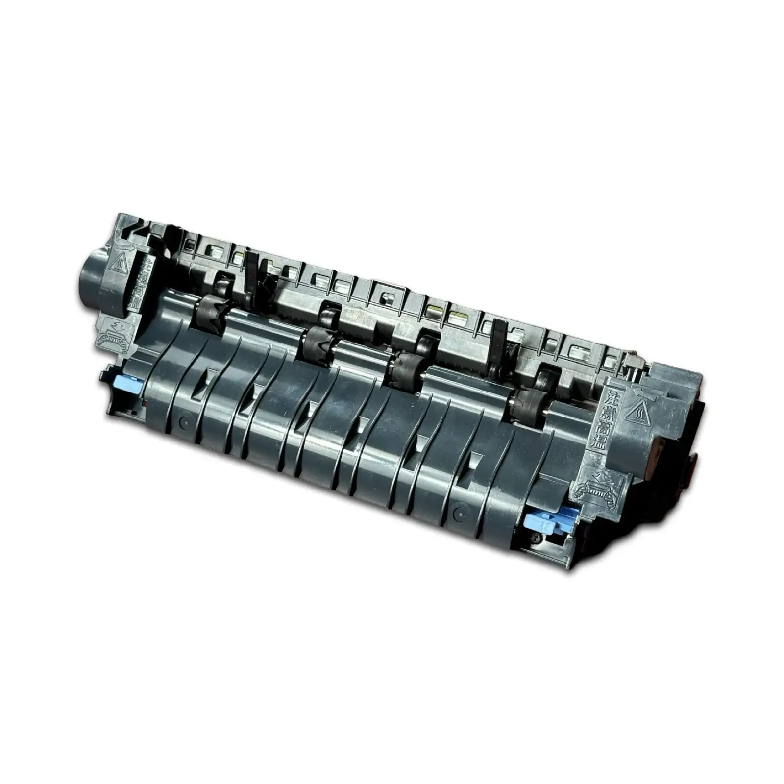 A black plastic HP LaserJet RM1-8395 100V fuser assembly with rollers and gears, displayed on a white background, used in M601, M602, and M603 printers to fuse toner onto paper.